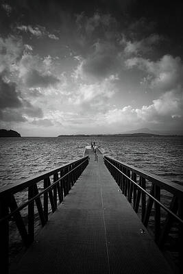 Lonely Pier Overlooking Vast Ocean Photograph