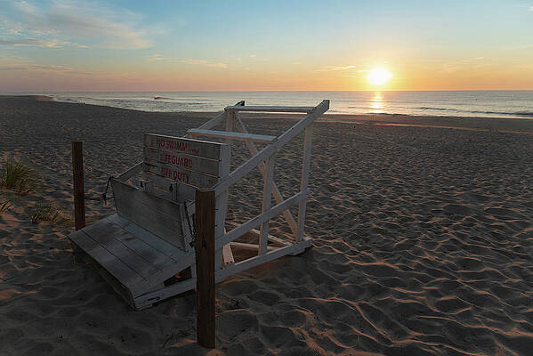 Summer Wall Art featuring the photograph Beach Sunrise With Lifeguard Chair On The Jersey Shore by Matthew DeGrushe