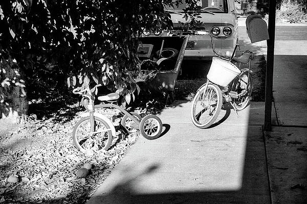 Vintage Bicycles on Sunny Street Photograph