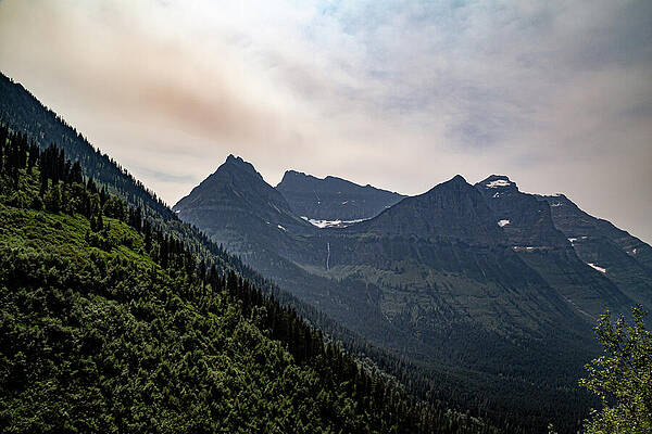 Mountain Range Under Cloudy Skies Wall Art
