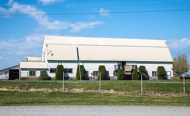 Sky Wall Art featuring the photograph Blue Sky White Barn by Tom Cochran