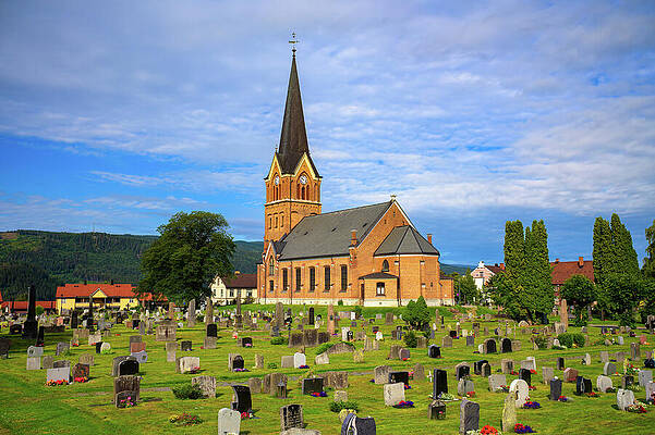 Wall Art featuring the photograph Brick Church With Tall Steeple And Surrounding Cemetery In Lillehammer, Norway by Miroslav Liska