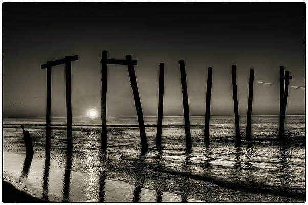 Sunrise Wall Art featuring the photograph Broken Piers by Louis Dallara