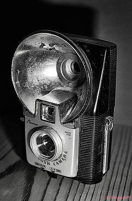 Wall Art featuring the photograph Brownie Starflash Camera 1060s BW by Rene Vasquez