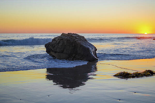 Wall Art featuring the photograph California Beach Sunset With Rock Reflection by Matthew DeGrushe