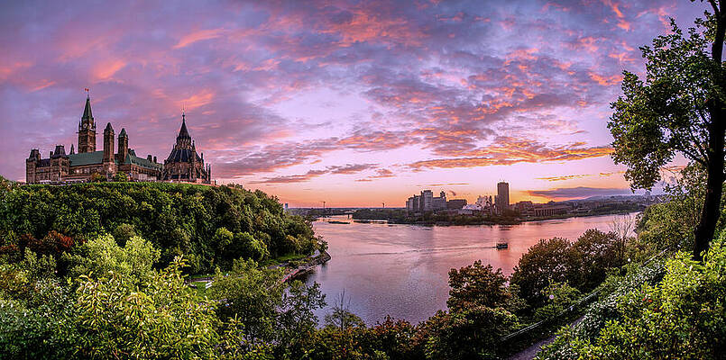 Architecture Photograph - Canadian Parliament Over Ottawa River At Sunset by John Twynam