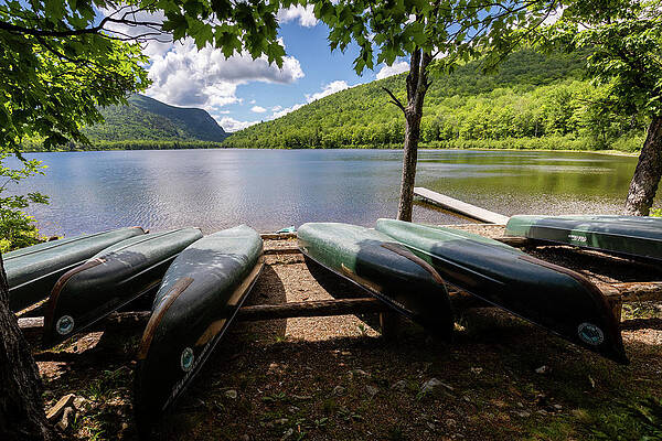 Reflection Wall Art featuring the photograph Canoes On The Shoreline by Craig A Walker