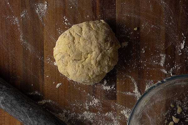 Raw Photograph - Cheese Scone Dough On A Wooden Surface by Scott Lyons