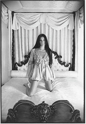 Woman Posed on Canopy Bed Photograph