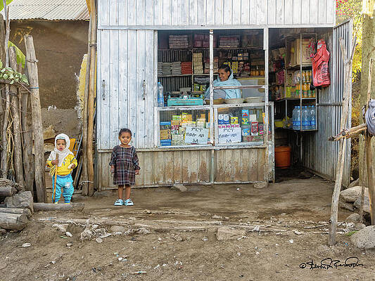 Rustic Wall Art featuring the photograph Children Enjoying A Moment At A Lalibela Store by Steven Dos Remedios