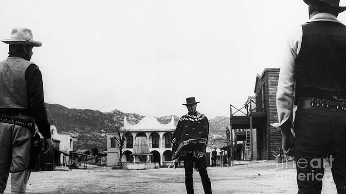 Wall Art featuring the digital art Clint Eastwood - A Fist Full Of Dollars 1964 by Antonios Valamontes