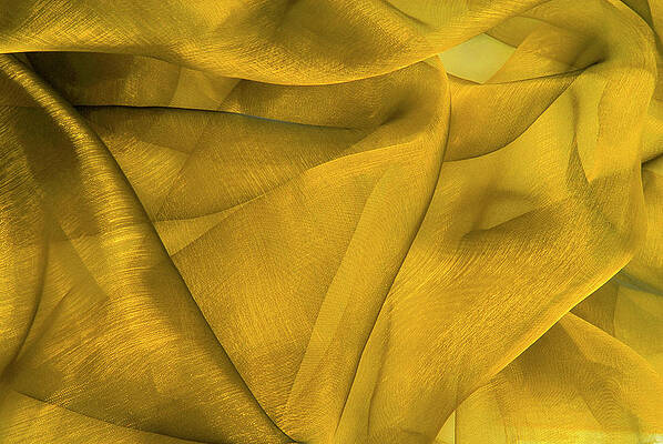 Clothing Photograph - Close Up Of The Yellow Wavy Organza Fabric by Severija Kirilovaite