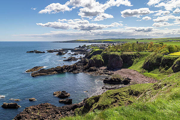 Coastal Cliffs and Azure Sea Photograph