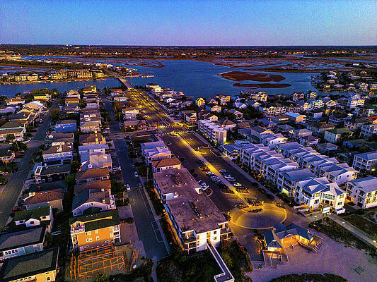 Sunrise Wall Art featuring the photograph Community At Dawn by Oceanic SkyView