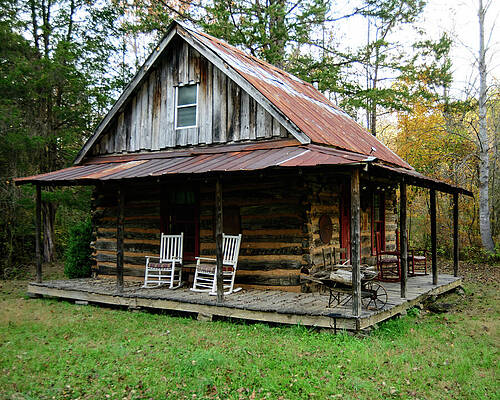 Country log cabin by Flees Photos