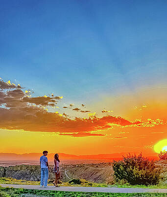 Couple Admiring Colorful Sunset by Josiah