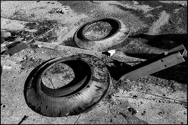 Discarded Tires on Pavement Wall Art