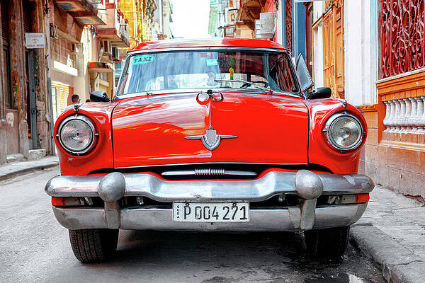 Travel Photograph - Cuba Fuerte Collection - Red Taxi Of Havana by Philippe HUGONNARD