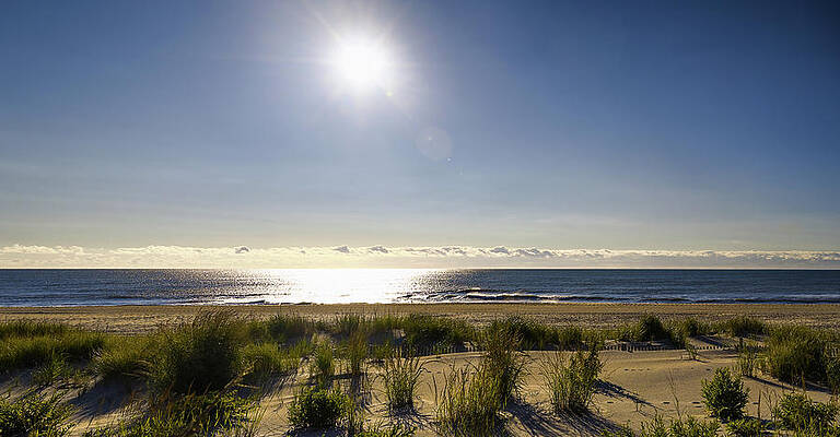 Wall Art featuring the photograph Dawn Over The Surf by Steven Nelson