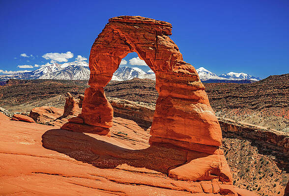 Color Photograph - Delicate Arch And Blue Sky, Utah by Abbie Warnock