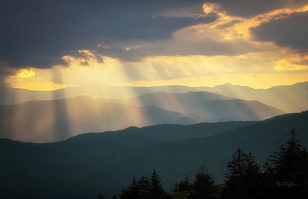 Sunbeams Over Mountain Range Photograph