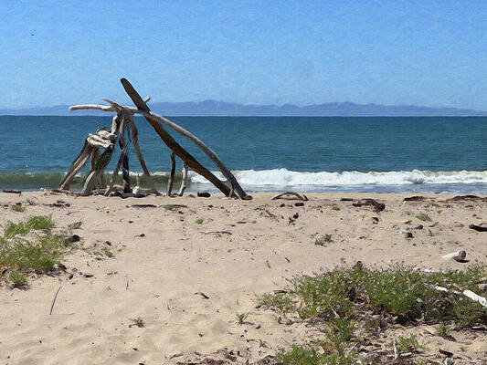 Driftwood Structure on Sandy Beach Wall Art