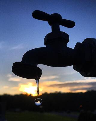 Beautiful Wall Art featuring the photograph Dripping Spigot Silhouette by Greg Lane