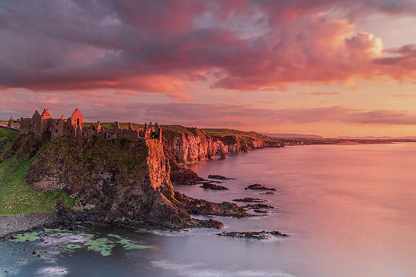 Sunset Photograph - Dunluce Castle Sunset, Co Antrim, Northern Ireland by Adrian Hendroff
