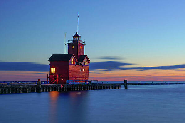 Architecture Wall Art featuring the photograph Dusk At The Holland Harbor Lighthouse by Michael Collins