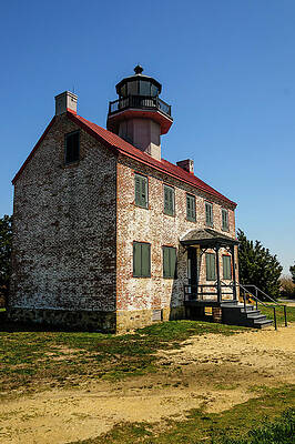 Wall Art featuring the photograph East Point Lighthouse Photograph by Louis Dallara