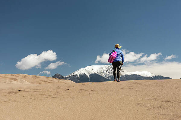 Cloud Photograph - Exploring The Dunes by Craig A Walker