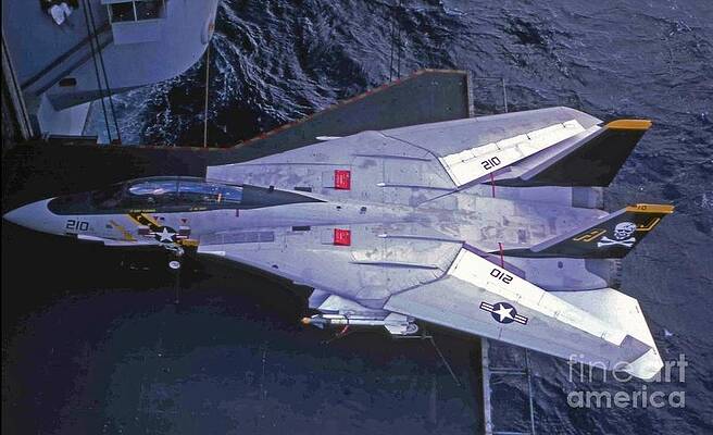 Wall Art featuring the photograph F14 On Elevator Desk by Antonios Valamontes