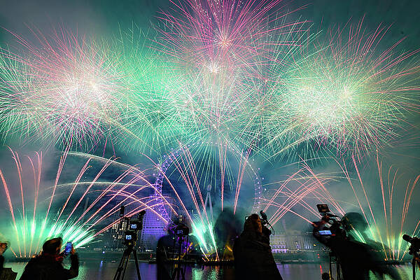 Wall Art featuring the photograph Fireworks At New Years Eve by Andrew Lalchan