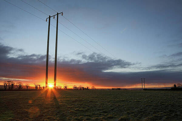 Sunset Over Open Field Photograph