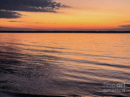 Serene Sunset Over Calm Waters Photograph