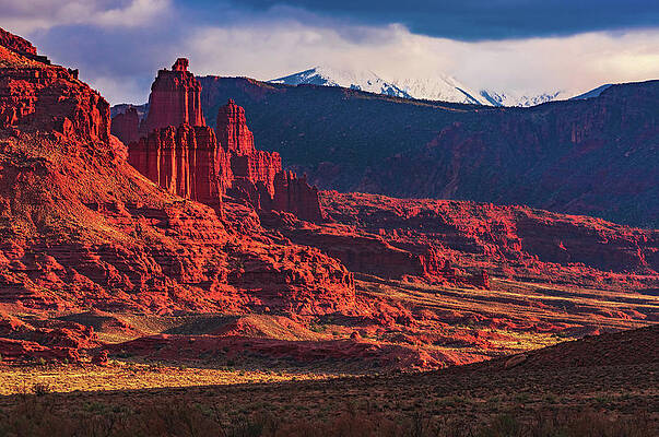 Sunset Photograph - Fisher Towers And La Sals, Utah by Abbie Warnock