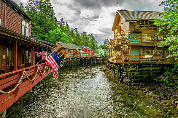 Wall Art featuring the photograph Flag Over Ketchikan Creek by William D Briscoe