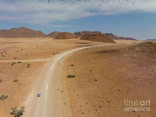 Landscape Photograph - Four-wheels Car On Desert Road D1273 Nearby Solitaire, Namibia by Sami Sarkis Photography