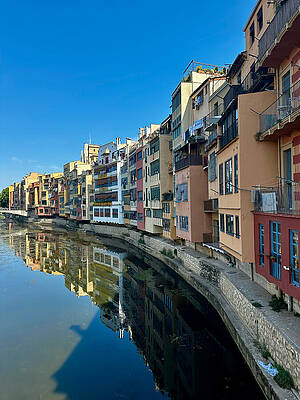 Colorful Buildings Along a Riverside Wall Art