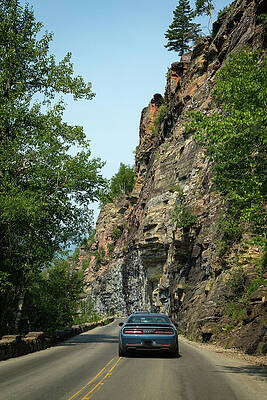 Car Driving Along Rocky Cliff Road Wall Art