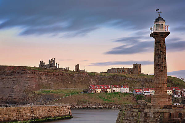 Photograph - Golden Hour Skies Over Whitby Abbey And The Pier At Whitby Bay by Charnwood Photography Fine Art