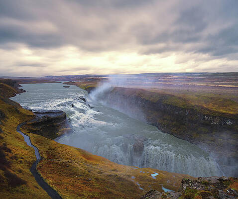 Sunset Photograph - Gulfoss Waterfall In Iceland At Sunset by John Twynam