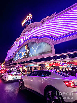 Wall Art featuring the photograph Harrahs Las Vegas Lit Up On The Strip At Night by FeelingVegas Wall Art and Prints