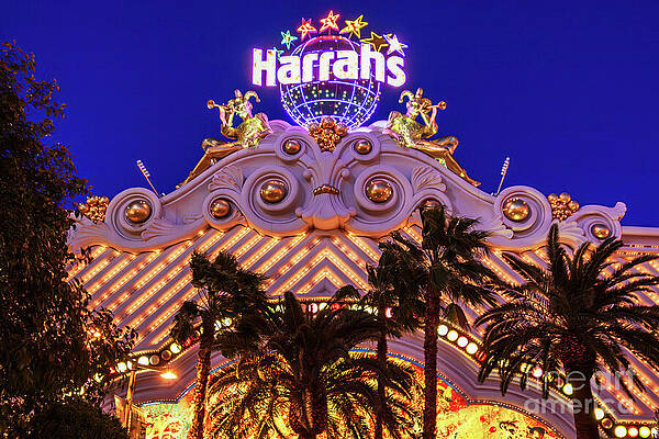 Nevada Wall Art featuring the photograph Harrah's Sign At Night - Las Vegas by Tatiana Travelways