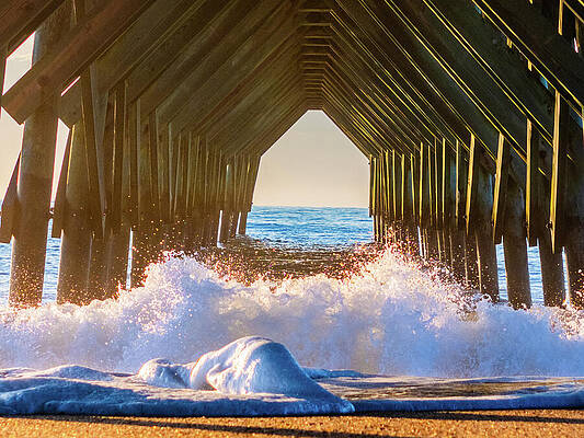 North Carolina Wall Art featuring the photograph High Tide Under The Pier by Oceanic SkyView