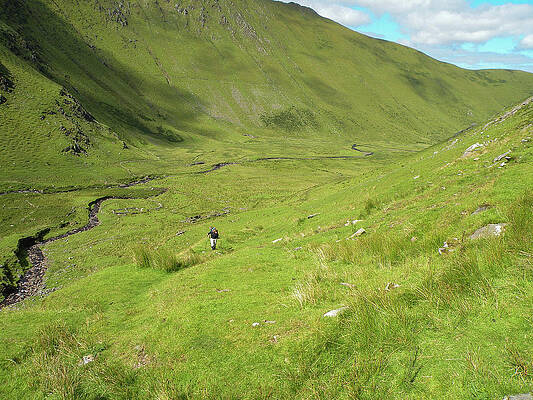 Sky Wall Art featuring the photograph Irish Valley With Trekkers by Steve Templeton