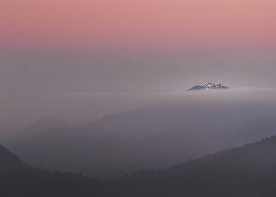 Winter Wall Art featuring the photograph Island In The Clouds A Slovenian Village Sunset by Charnwood Photography Fine Art