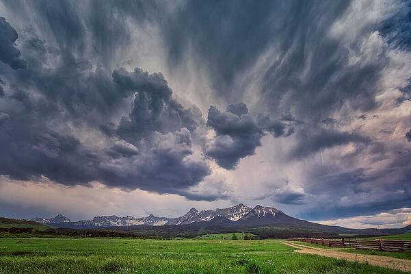 Landscape Photograph - January 2024 Stormy Meadow by Alain Zarinelli