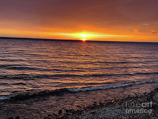 Sunset Over Serene Ocean Waves Photograph
