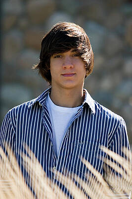 Young Man in Striped Shirt Wall Art
